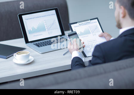 businessman working with new start up project using smart phone Stock Photo