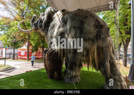 MOSCOW, August 13, 2018: Life-size mockup of a prehistoric mammoth animal on display in Moscow Garden Ring boulevard during Time and Epochs festival Stock Photo