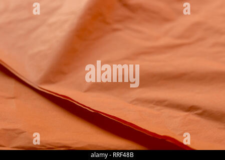 Detail of creased and wrinkled orange paper Stock Photo - Alamy