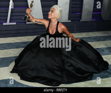 Beverly Hills, United States. 24th Feb, 2019. BEVERLY HILLS, LOS ANGELES, CA, USA - FEBRUARY 24: Singer/actress Lady Gaga wearing a Brandon Maxwell gown and Tiffany and Co. jewelry arrives at the 2019 Vanity Fair Oscar Party held at the Wallis Annenberg Center for the Performing Arts on February 24, 2019 in Beverly Hills, Los Angeles, California, United States. (Photo by Xavier Collin/Image Press Agency) Credit: Image Press Agency/Alamy Live News Stock Photo