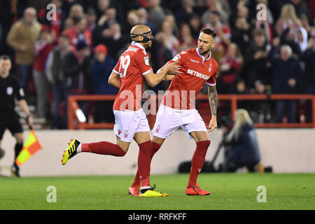 Nottingham, UK. 25th Feb, 2019. Yohan Benalouane (29) of Nottingham Forest celebrates after scoring in the opening minutes, with Alexander Milosevic (17) of Nottingham Forest after during the Sky Bet Championship match between Nottingham Forest and Derby County at the City Ground, Nottingham on Monday 25th February 2019. (Credit: Jon Hobley | MI News) Credit: MI News & Sport /Alamy Live News Stock Photo