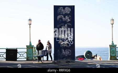 Brighton, UK. 26th Jan, 2019. The Kiss Wall by artist Bruce Williams on Brighton seafront as the unusually warm sunny weather continues throughout Britain with some areas forecast to reach over 20 degrees centigrade again Credit: Simon Dack/Alamy Live News Stock Photo