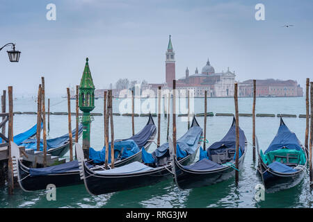 General views of gondolas and the Church of the Santissimo Redentore in the distance in Venice. From a series of travel photos in Italy. Photo date: S Stock Photo