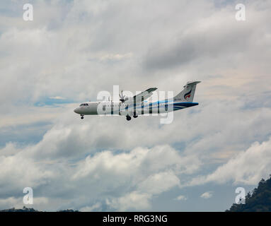 PHUKET, THAILAND - NOVEMBER 27, 2016: Bangkok Airways ATR 72-600, HS-PZC flies in the sky Stock Photo