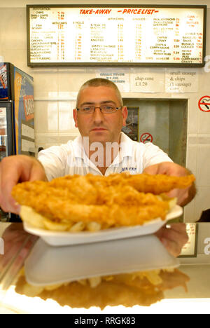 Gastronomy tourism: fish and chips in a small shop in Girvan´s waterfront, South Ayrshire, Scotland, United Kingdom Stock Photo