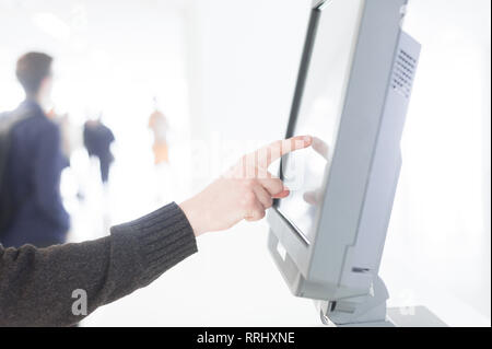 hand presses on screen digital tablet Stock Photo