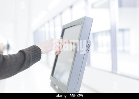 hand presses on screen digital tablet Stock Photo