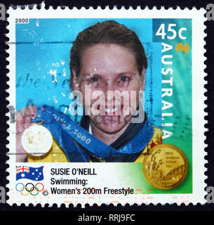 AUSTRALIA - CIRCA 2000: a stamp printed in Australia shows Susie O'Neil, Women's 200m Freestyle Winner, Australian Gold Medalist at 2000 Olympics, cir Stock Photo