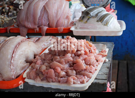 Raw fish chopped on a tray at sea food market in Chorrillos, Lima, Peru Stock Photo
