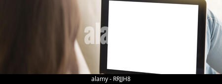 Panoramic back view woman using computer with mockup blank screen Stock Photo