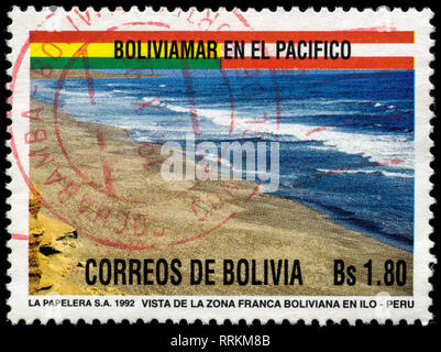 Postage stamp from Bolivia in the Agreement between Peru and Bolivia on the free port of Ilo series issued in 1992 Stock Photo