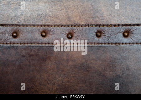 Leather with rivet texture background close up Stock Photo