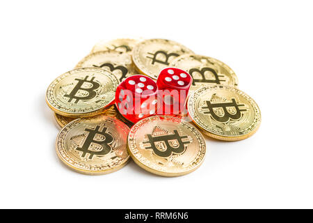 Red glass playing dices and bitcoins. Stock Photo