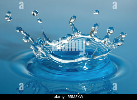 Blue water splash in shape of crown Stock Photo