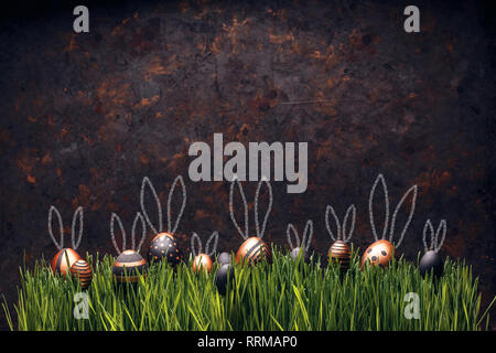 Set of stylish eggs with Easter bunny ears on green grass against grungy dark background, space for text Stock Photo