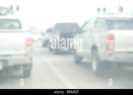 Driver on the steering wheel inside of a car Stock Photo