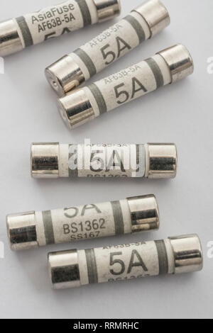 5 Amp household ceramic cartridge fuses. Stock Photo