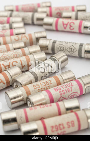 Mass of household ceramic cartridge fuses. Stock Photo