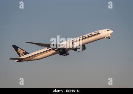 Singapore Airlines Boeing 777 jet airliner plane 9V-SWP taking off from London Heathrow Airport, UK. Airline flight departure Stock Photo