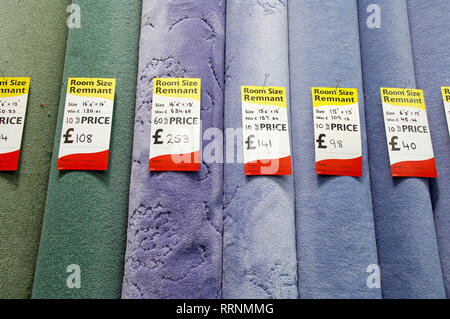 Rolls of carpets on offer in a carpet shop Stock Photo