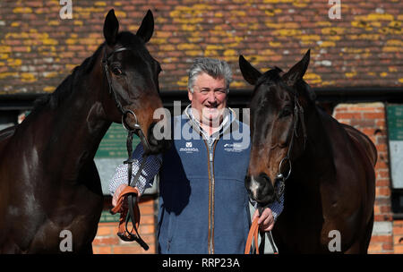 Trainer Paul Nicholls with Clan Des Obeaux (left) and Frodon (right) during the visit to Paul Nicholls' Yard at Manor Farm Stables, Ditcheat. Stock Photo