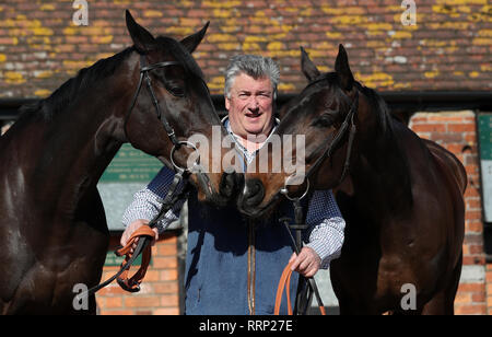 Trainer Paul Nicholls with Clan Des Obeaux (left) and Frodon (right) during the visit to Paul Nicholls' Yard at Manor Farm Stables, Ditcheat. Stock Photo