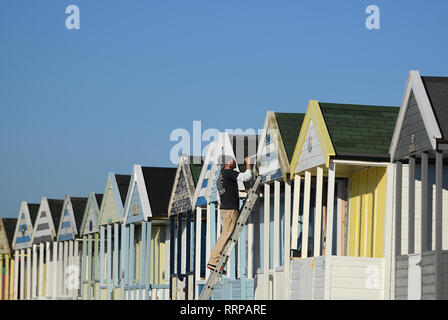 A man paints beach huts along the sea front at Southwold in Suffolk, as Britain could experience more record-breaking temperatures this week. PRESS ASSOCIATION The UK has experienced its warmest winter day since records began with temperatures hitting 20.8C in Porthmadog, Gwynedd, west Wales on Tuesday as Britain could experience more record-breaking temperatures this week. See PA story WEATHER Warm. Photo credit should read: Joe Giddens/PA Wire Stock Photo