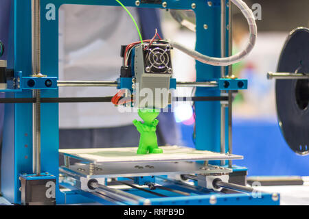 Automatic 3d printer performs a three-dimensional product creation, close-up Stock Photo