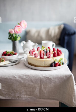Delicious strawberry pie with fresh blueberry on table, cheesecake. Concept of sweet food, idea of healthy life Stock Photo