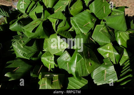 Thai dessert egg custard with sticky rice on banana leaf Stock Photo