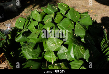 Thai dessert egg custard with sticky rice on banana leaf Stock Photo