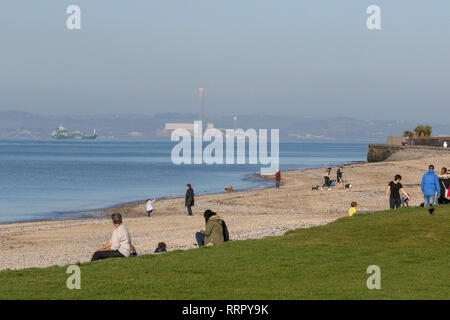 Holywood, County Down, Northern Ireland. 26 February 2019. UK weather - glorious sunshine on the coast of Belfast Lough at Holywood. Plenty of people about taking in the exceptional late winter weather with temperatures around 16 C. Credit: David Hunter/Alamy Live News. Stock Photo