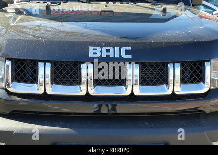 24 February 2019, Köln: The lettering of the Chinese automobile manufacturer BAIC Beijing Automotive Industry Holding stands on a Baic B40 SUV. Photo: Horst Galuschka/dpa Stock Photo