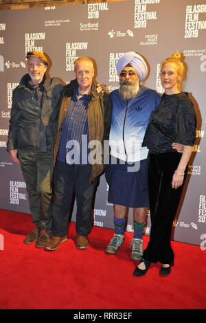 Glasgow, UK. 26th Feb, 2019. (left - right) Charlie Paul - Director; Peter Howson - Artist; Hardeep Singh Kohli - Presenter; unknown, seen on the red carpet at the Premier of the film, Prophecy, at the Glasgow Film Theater. Credit: Colin Fisher/Alamy Live News Stock Photo