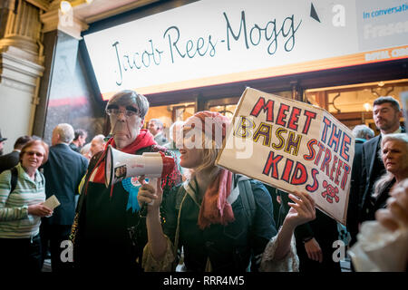 Transgender activist, Tara Wolf(pictured with megaphone), joins the Class War protest. Protesters from Class War anarchist group hold a lively demonstration outside the London Palladium theatre against the evening talk featuring Jacob Rees-Mogg, Conservative MP and prominent Brexit supporter. Class War members, including long-time anarchist, Ian Bone, Jane Nicholl (dressed as a nun) and Adam Clifford (pictured as Rees-Mogg parody) claim Mr Rees-Mogg, a Catholic, is a religious extremist because of his outspoken views on abortion. London, UK. Stock Photo