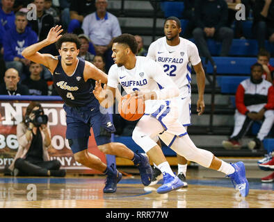 Amherst, New York, USA. 26th Feb 2019. Akron Zips guard Tyler Cheese (4) defends against Buffalo Bulls guard Jayvon Graves (3) during the second half of play in the NCAA Basketball game between the Akron Zips and Buffalo Bulls at Alumni Arena in Amherst, N.Y. (Nicholas T. LoVerde/Cal Sport Media) Credit: Cal Sport Media/Alamy Live News Stock Photo