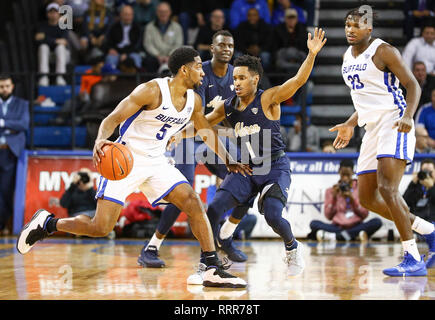Amherst, New York, USA. 26th Feb 2019. Akron Zips guard Loren Cristian Jackson (1) defends against Buffalo Bulls guard CJ Massinburg (5) during the second half of play in the NCAA Basketball game between the Akron Zips and Buffalo Bulls at Alumni Arena in Amherst, N.Y. (Nicholas T. LoVerde/Cal Sport Media) Credit: Cal Sport Media/Alamy Live News Stock Photo