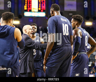 Amherst, New York, USA. 26th Feb 2019. Akron Zips head coach John Groce gives instructions to his players during a break in the second half of play in the NCAA Basketball game between the Akron Zips and Buffalo Bulls at Alumni Arena in Amherst, N.Y. (Nicholas T. LoVerde/Cal Sport Media) Credit: Cal Sport Media/Alamy Live News Stock Photo