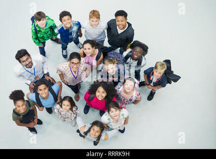 Portrait confident junior high students and teachers from above Stock Photo