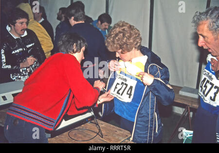 First London Marathon view inside login marquee barcode scanner recording runners Gillette barcode on computer by Olivetti staff Greenwich England UK Stock Photo