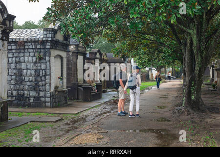 New Orleans Cemetery, view of tourists visiting Lafayette Cemetery No.1 in the Garden District of New Orleans, Louisiana, USA Stock Photo