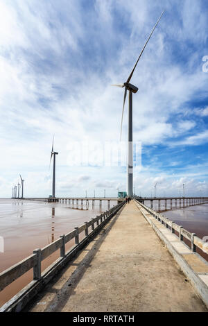 Seacape with Turbine Green Energy Electricity, Windmill for electric power production on the sea at  Bac Lieu, Vietnam. Aerial view Stock Photo
