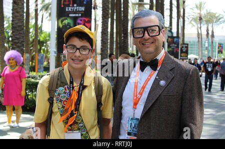 Wondercon attendees pose in their cosplay outfits as Russel and Carls Fredrickson from the movie UP Stock Photo