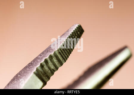 elements small foldable steel multitool, closeup, macro Stock Photo
