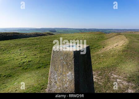 Triangulation point or station at the top of White Sheet Hill with beautiful views across the countryside in Wiltshire, UK Stock Photo