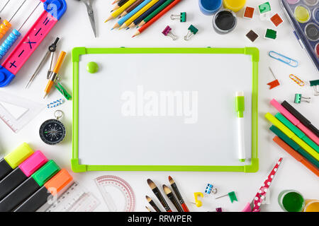 School supplies with flipchart on white. Top view. Stock Photo