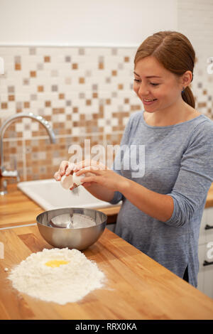 woman prepare pie dough in her kitchen Stock Photo