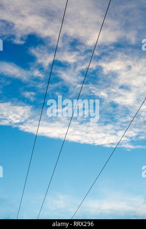 Power line against sunset sky Stock Photo