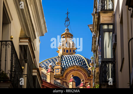 Blue and white ceramic tiled roof on church in Seville, Spain on 23 September 2015 Stock Photo