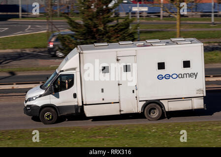 GEOamey van on the road. Used for escorting prisoners between custody, courts and prisons GEOAmey provides prison escort and custody services Stock Photo